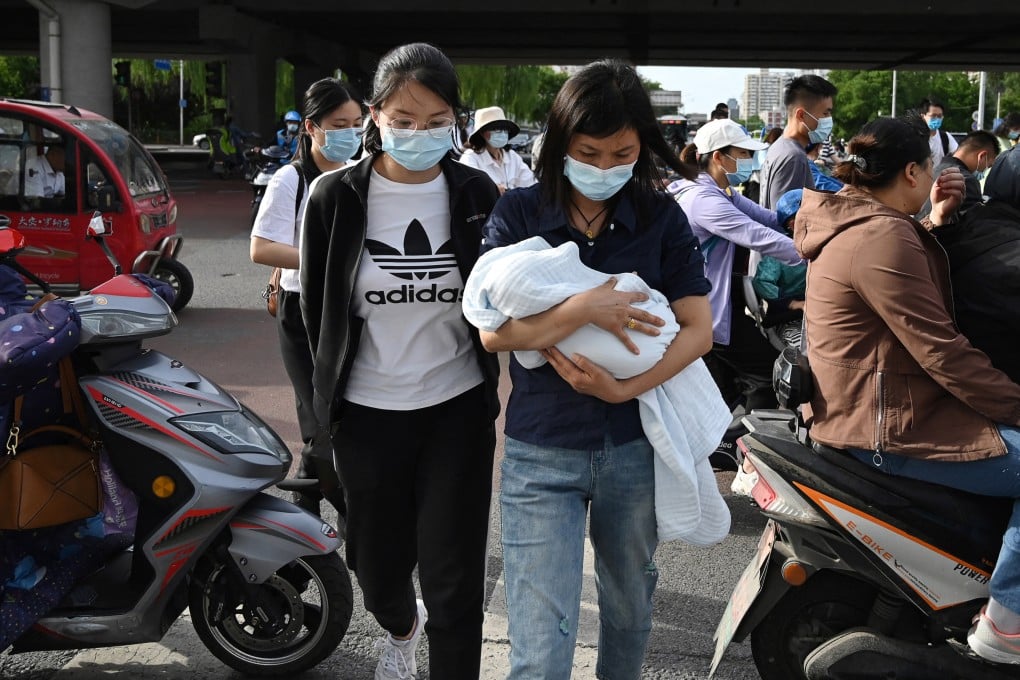 China had a population of 1.4126 billion at the end of last year, with the growth rate rising at the slowest pace since the 1950s. Photo: AFP