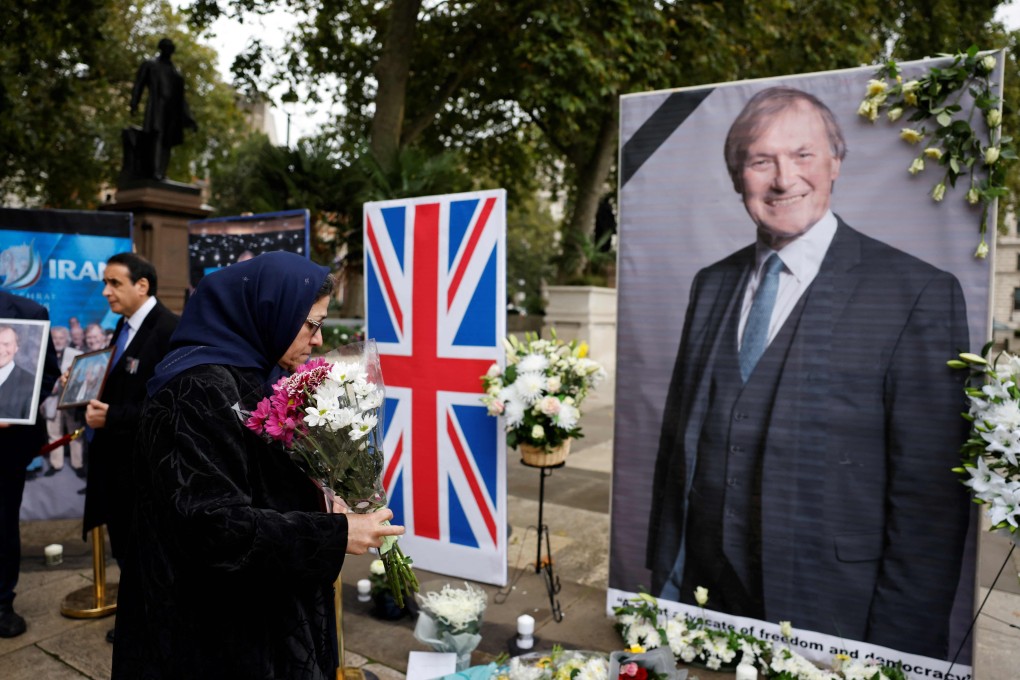 Members of the Anglo-Iranian community and supporters of the National Council of Resistance of Iran (NCRI) attend a memorial service to pay tribute to murdered British politician David Amess in London in October 2021. Photo: AFP