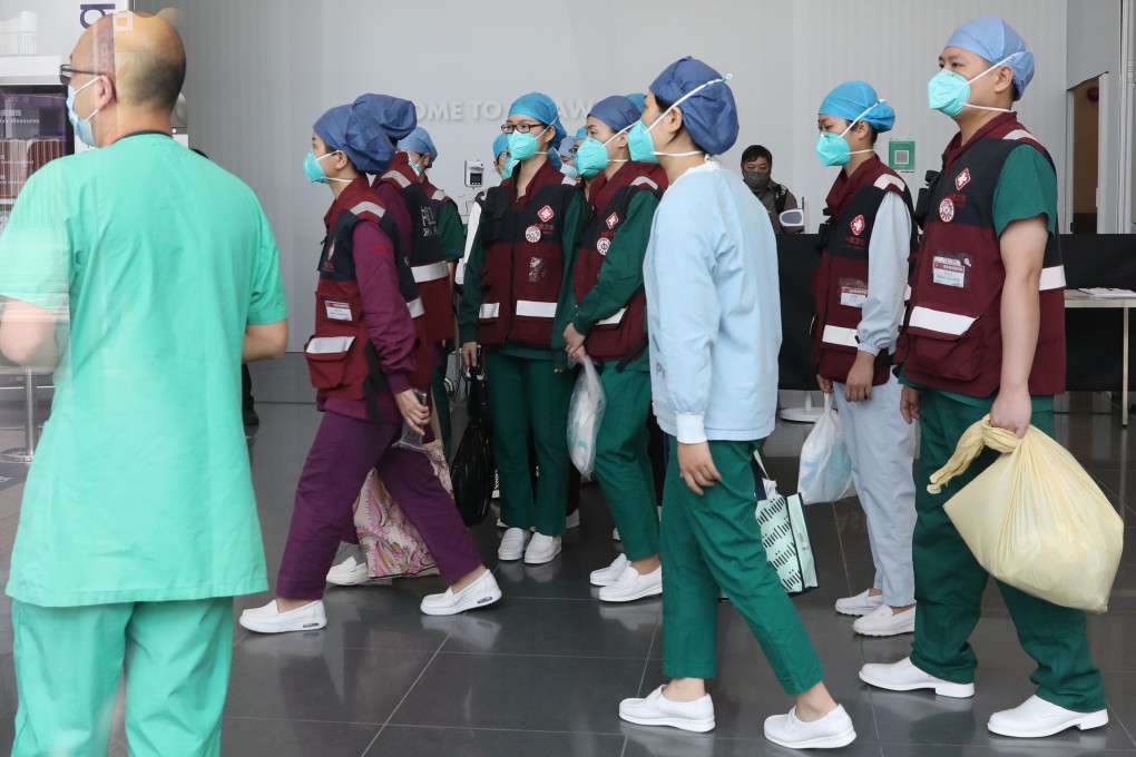 Mainland medical staff arrive at AsiaWorld-Expo earlier this month to help look after elderly Covid-19 patients with chronic illnesses. Photo: Jelly Tse
