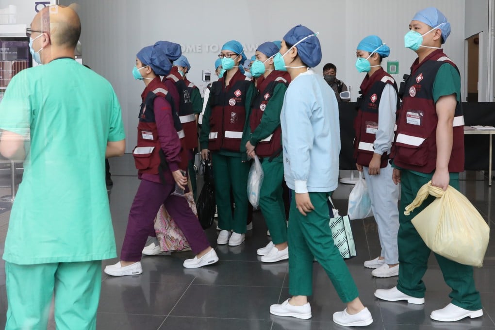 Mainland medical staff arrive at AsiaWorld-Expo earlier this month to help look after elderly Covid-19 patients with chronic illnesses. Photo: Jelly Tse