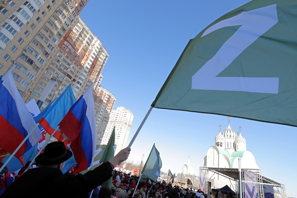 An activist waves a flag with the letter ‘Z’ during a rally in support of Russian Armed Forces in Moscow. Photo: EPA-EFE
