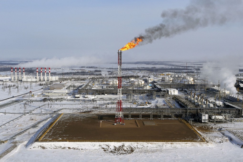 A flame burns atop a tower at an oilfield in Siberia. India is forging ahead with plans to buy discounted Russian oil. Photo: Reuters