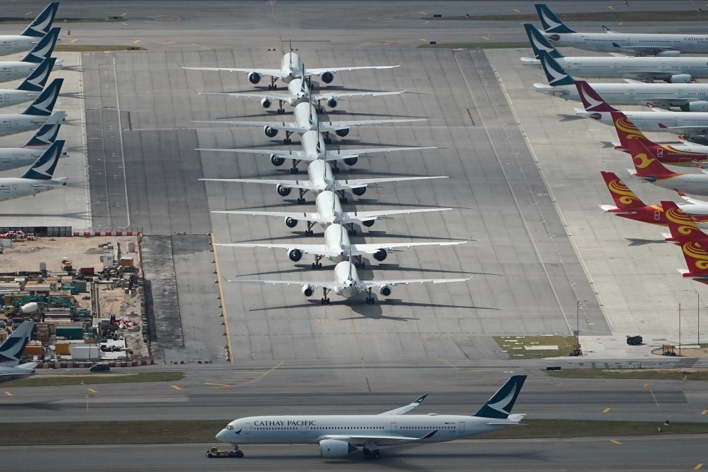 Commercial aircraft sit grounded at Hong Kong International Airport at an earlier stage of the pandemic. Photo: Felix Wong