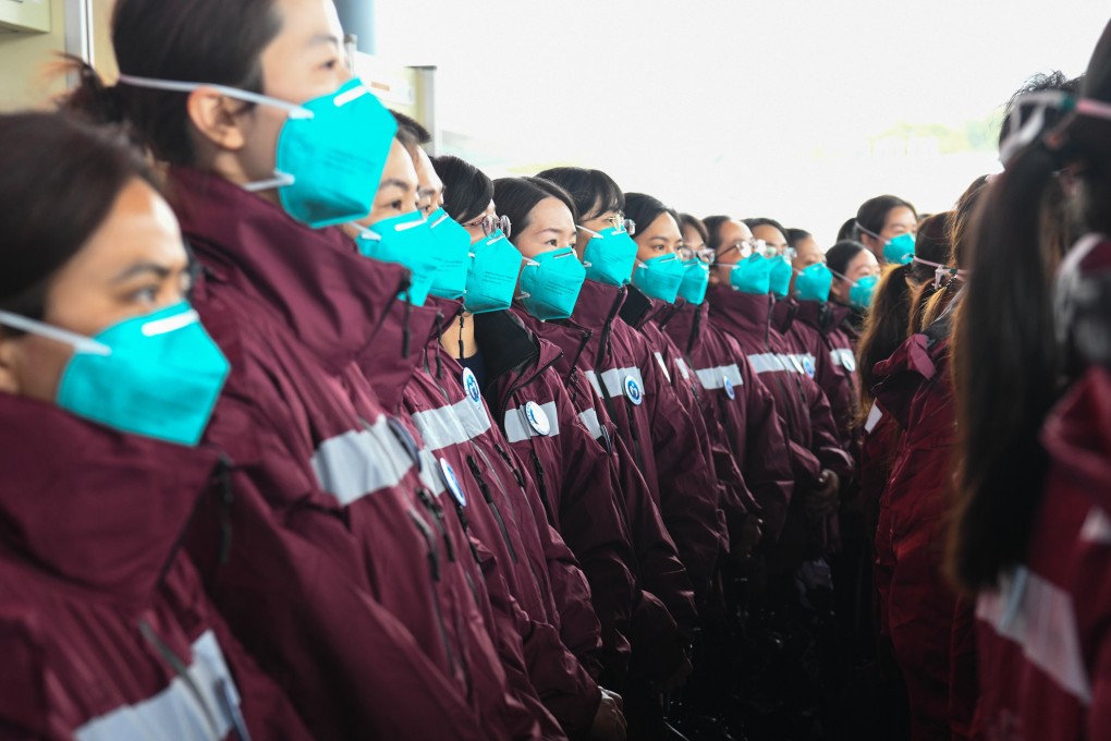 A group of mainland volunteers prepare to leave Shenzhen for Hong Kong to help the city fight against the pandemic on February 19. Photo: Xinhua