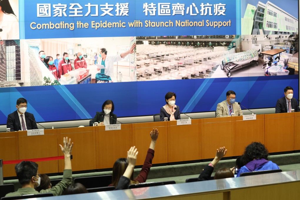 Media representatives raise their hands to ask questions at a press conference chaired by Chief Executive Carrie Lam Cheng Yuet-ngor (centre) on March 14. Photo: May Tse