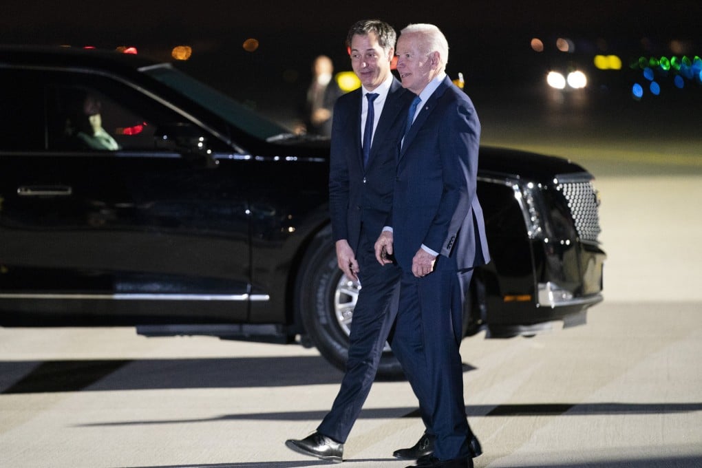 US President Joe Biden is greeted by Belgian Prime Minister Alexander de Croo (left) after arriving at Brussels National Airport on Wednesday night. Photo: AP