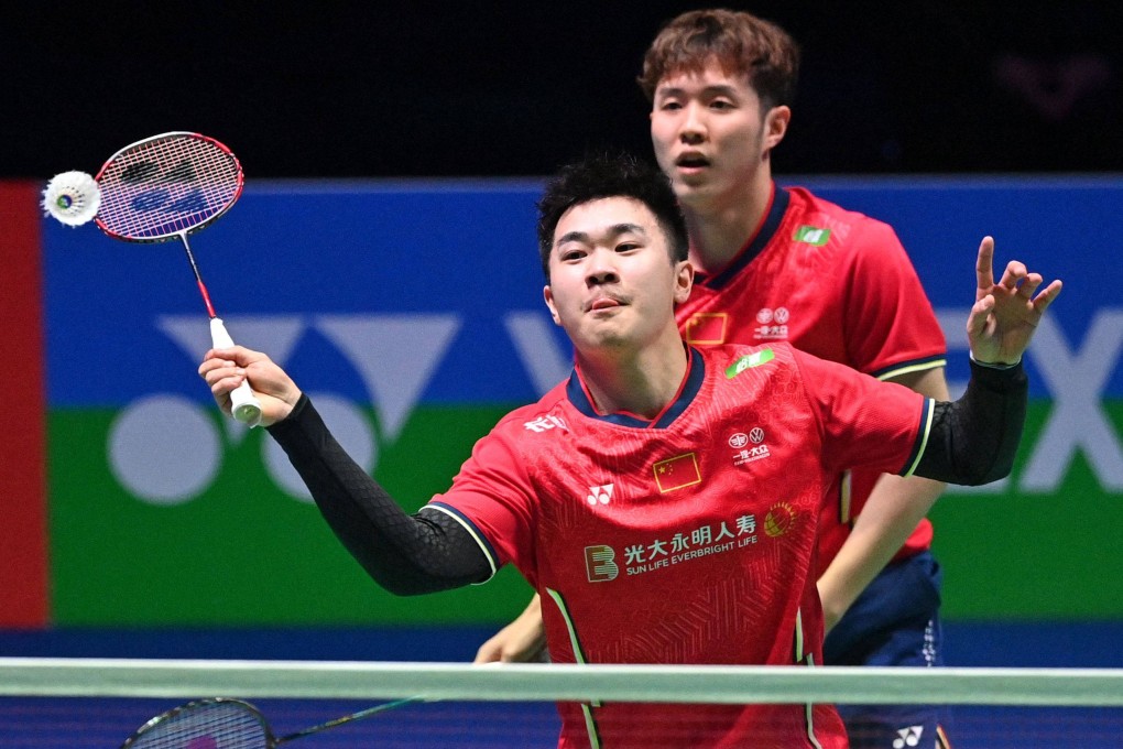 Tan Qiang (left) and He Jiting of the Chinese team in a men’s doubles semi-final game against Mohammad Ahsan and Hendra Setiawan of Indonesia at the All England Open Badminton Championship event in Birmingham. Photo: AFP