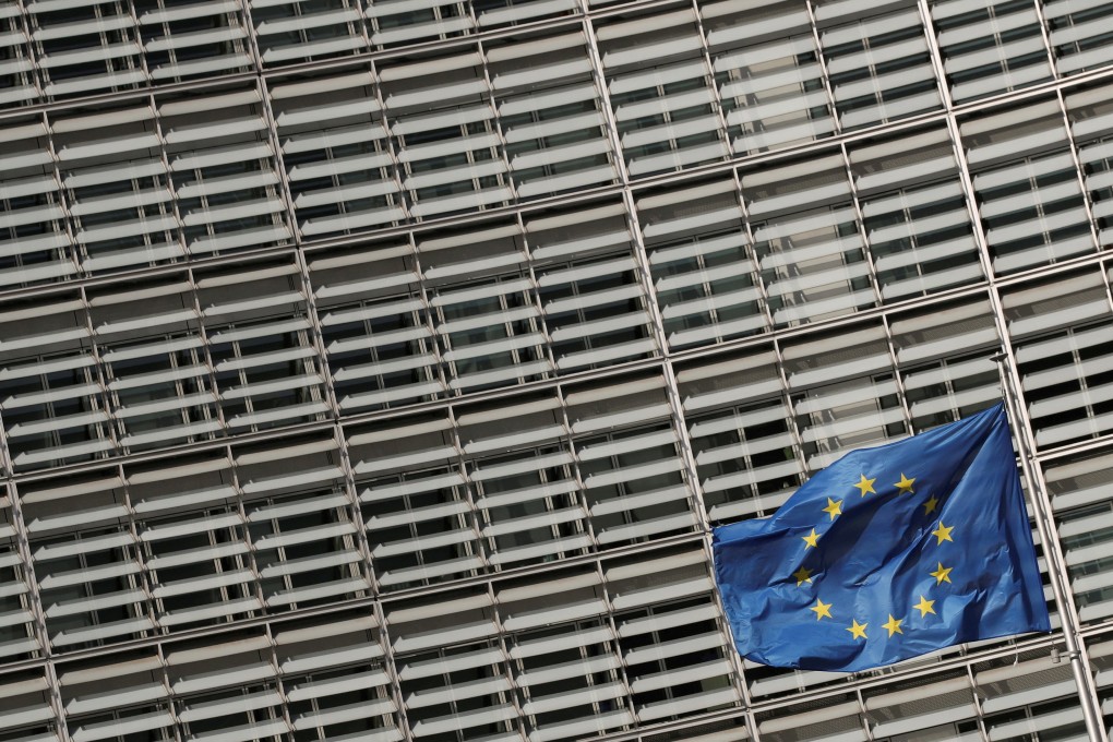 A European Union flag flutters outside the European Commission headquarters in Brussels, Belgium. Photo: Reuters