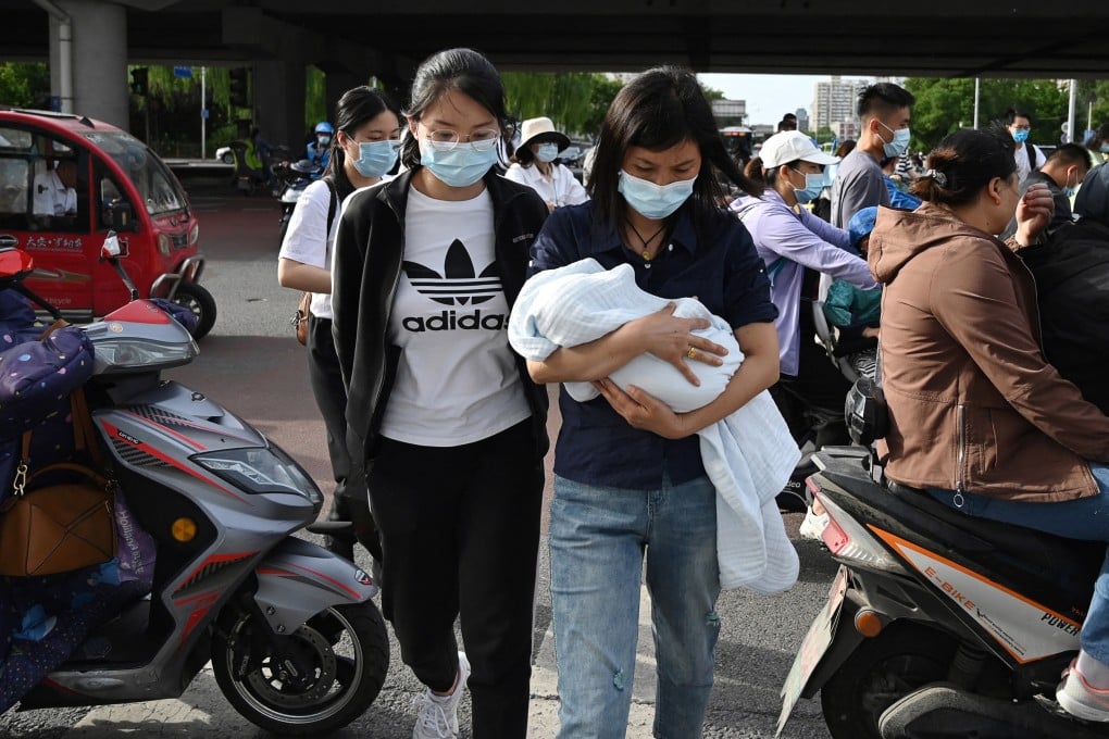 Mainland China’s overall population increased to 1.4126 billion in 2021, but the national growth rate hit a record low of just 0.34 per thousand. Photo; AFP