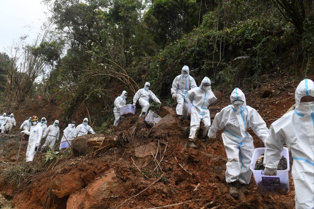 Searchers have recovered some human remains and personal belongings from the site. Photo: Xinhua
