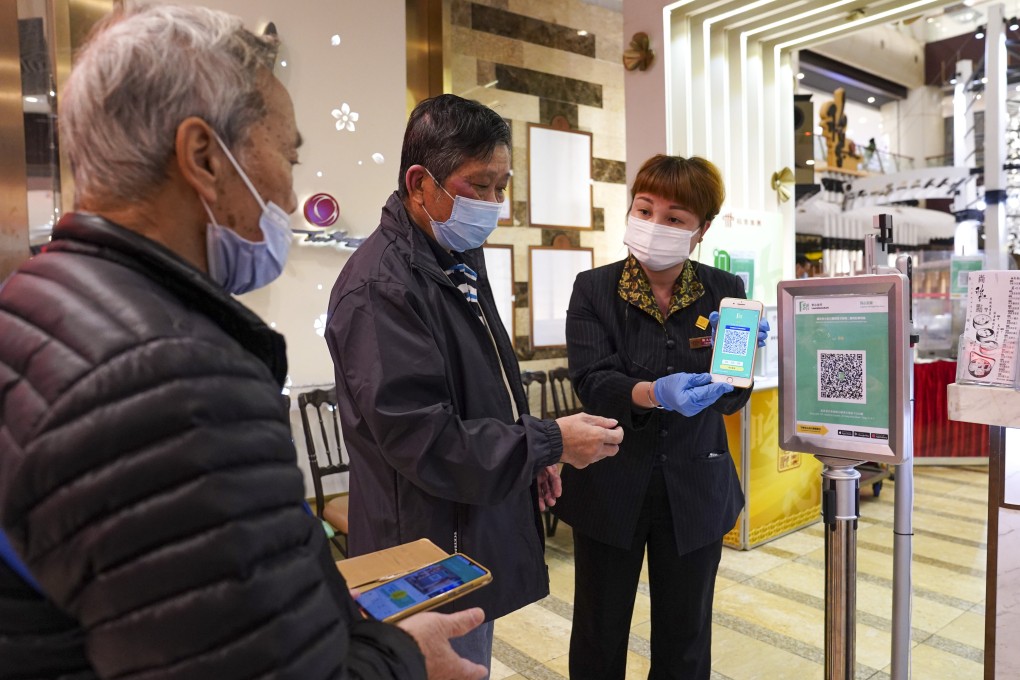 Customers must show proof of vaccination status before entry into various premises such as restaurants. Photo: Sam Tsang