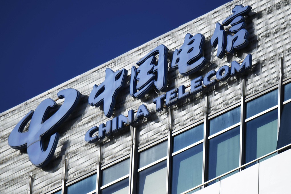 A logo is seen at China Telecom Corp’s offices in Beijing. Photo: Kyodo