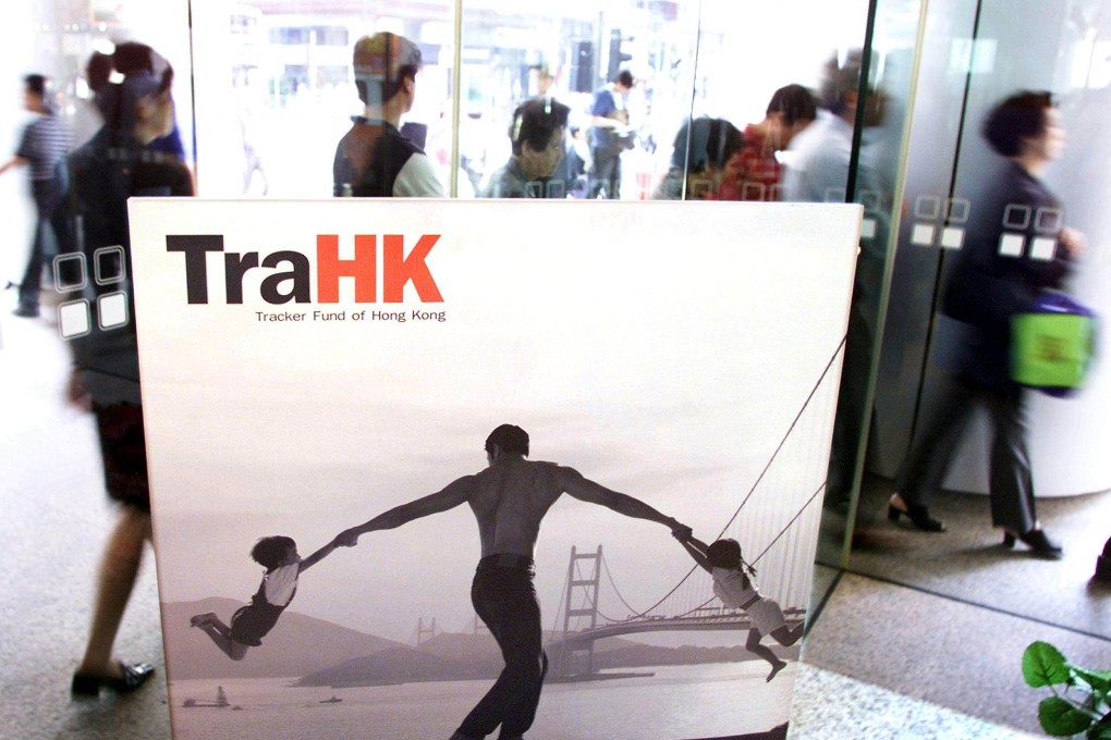 People queue outside a Hong Kong bank to get application forms for the new Tracker Fund of Hong Kong (TraHK) at the launch of the initial public offering in October 1999. Photo: AFP
