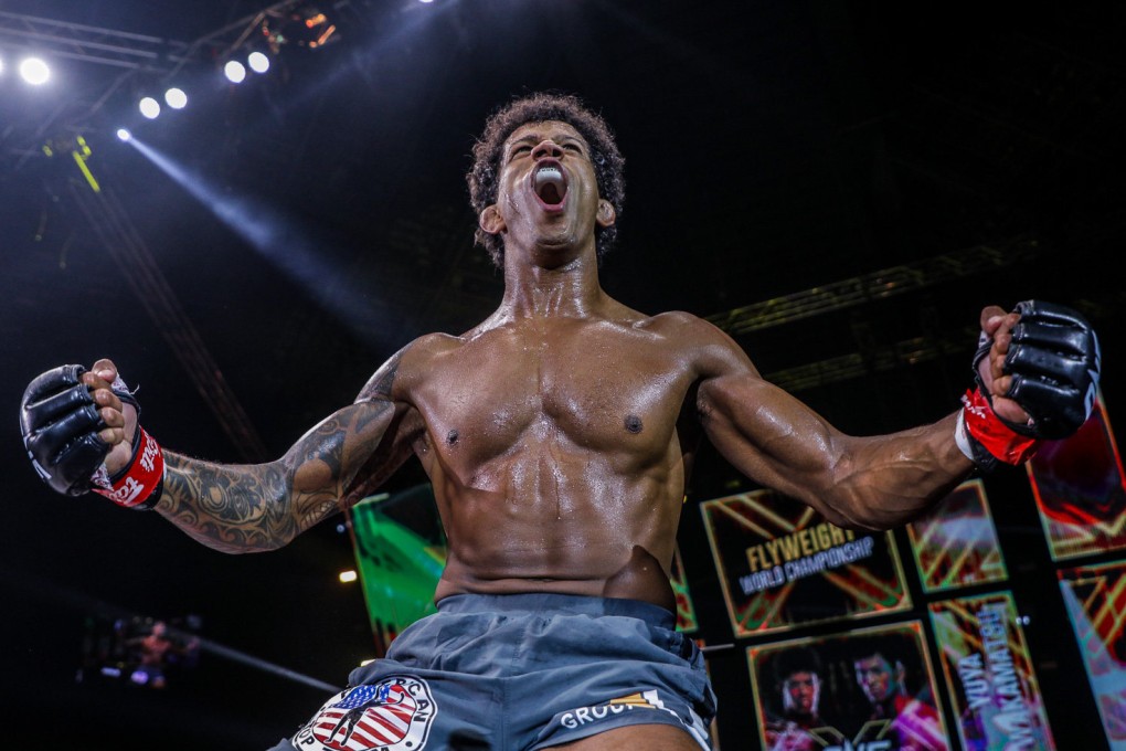 Adriano Moraes celebrates on top of the cage after beating Yuya Wakamatsu at ONE X. Photos: ONE Championship
