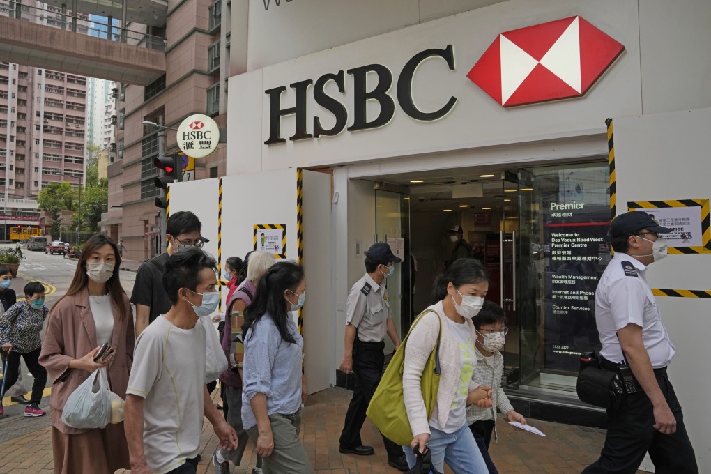 HSBC has divided its 100 local branches into two groups and let each open on alternative days during the week, which means about 50 branches are open every day. Photo: AP