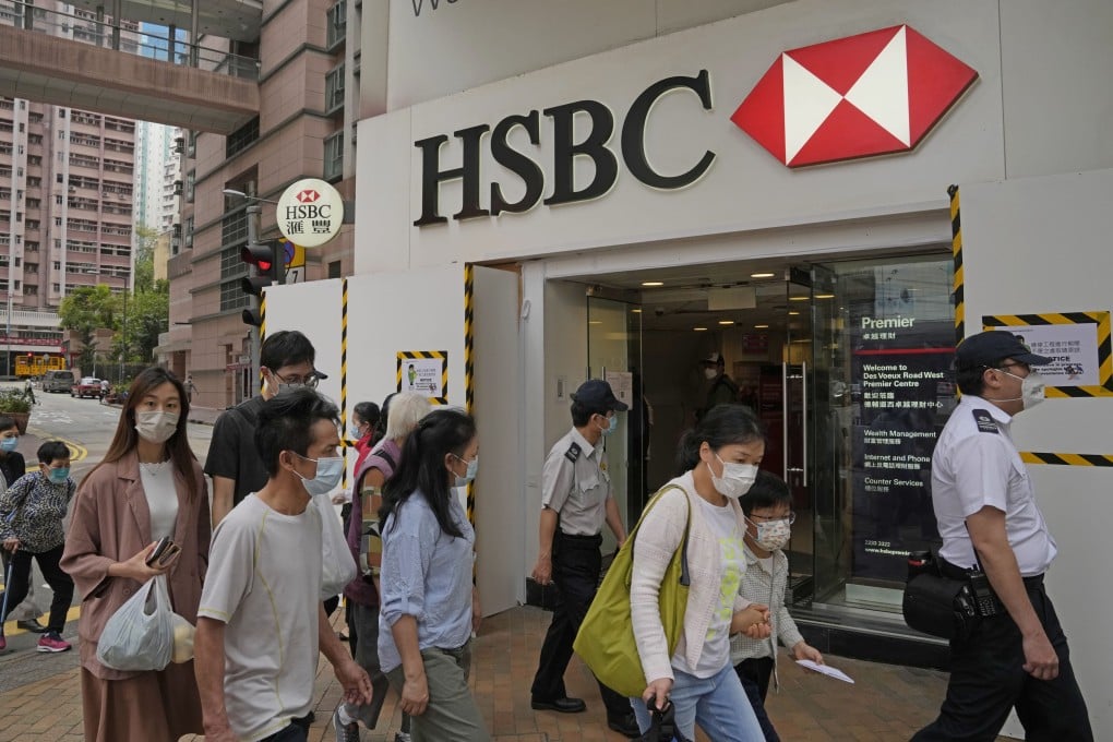 HSBC has divided its 100 local branches into two groups and let each open on alternative days during the week, which means about 50 branches are open every day. Photo: AP
