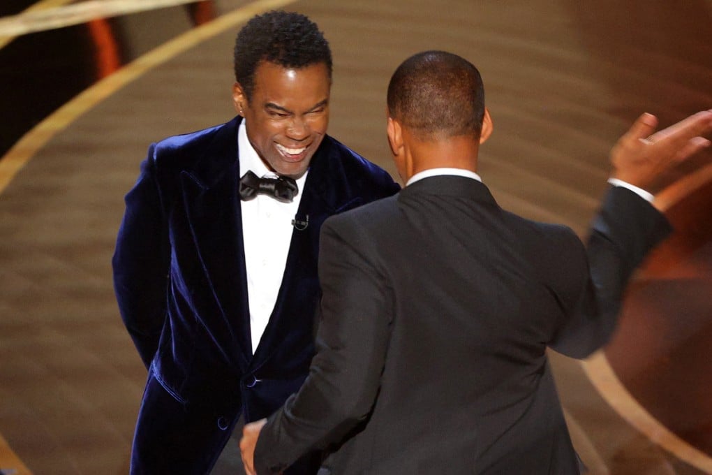 Will Smith hits Chris Rock at the Oscars ceremony on Sunday. It was a slap heard around the world, but not the first shocking moment at an Academy Awards presentation. Photo: Reuters