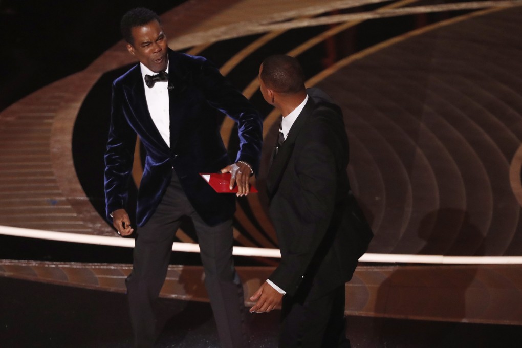 Actor Will Smith (right) swings at US actor Chris Rock during the Academy Awards ceremony at the Dolby Theatre in Hollywood. Photo: EPA-EFE