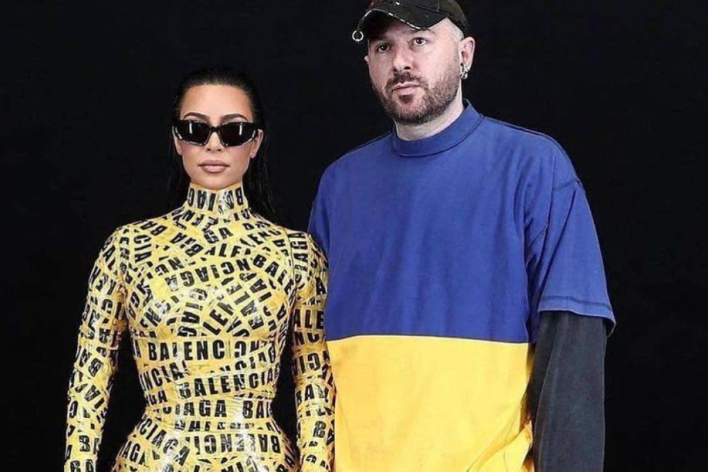 Demna Gvasalia (right, with Kim Kardashian), who wore a T-shirt in the colours of the Ukrainian flag at the Balenciaga show in Paris in March 2022. Photo: Instagram