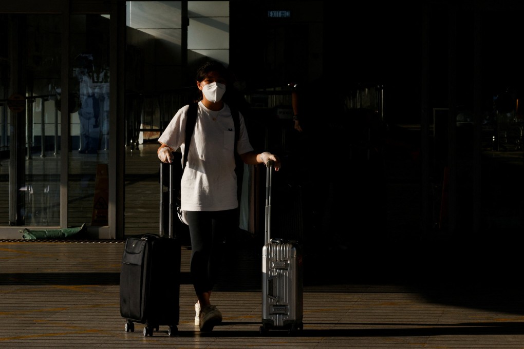 A traveller walks at the mainland-Hong Kong border of Shenzhen Bay Port on March 14. Chief Executive Carrie Lam Cheng Yuet-ngor has stressed that resuming quarantine-free travel with mainland China was still the government’s main goal. Photo: Reuters