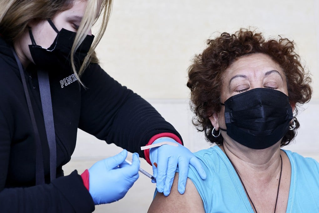 A patient receives a Covid-19 vaccination dose in Los Angeles, California, in January. Photo: TNS