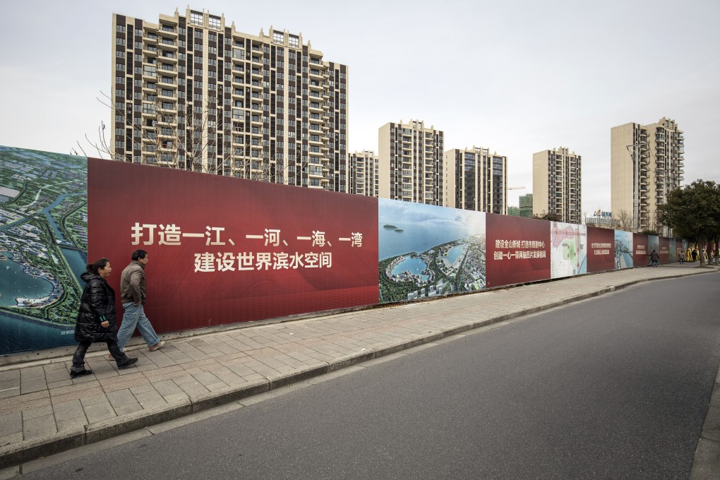 Apartment buildings at the Phoenix City residential project, developed by Country Garden Holdings, in Shanghai. The company posted a profit decline for 2021 on Wednesday. Photo: Bloomberg