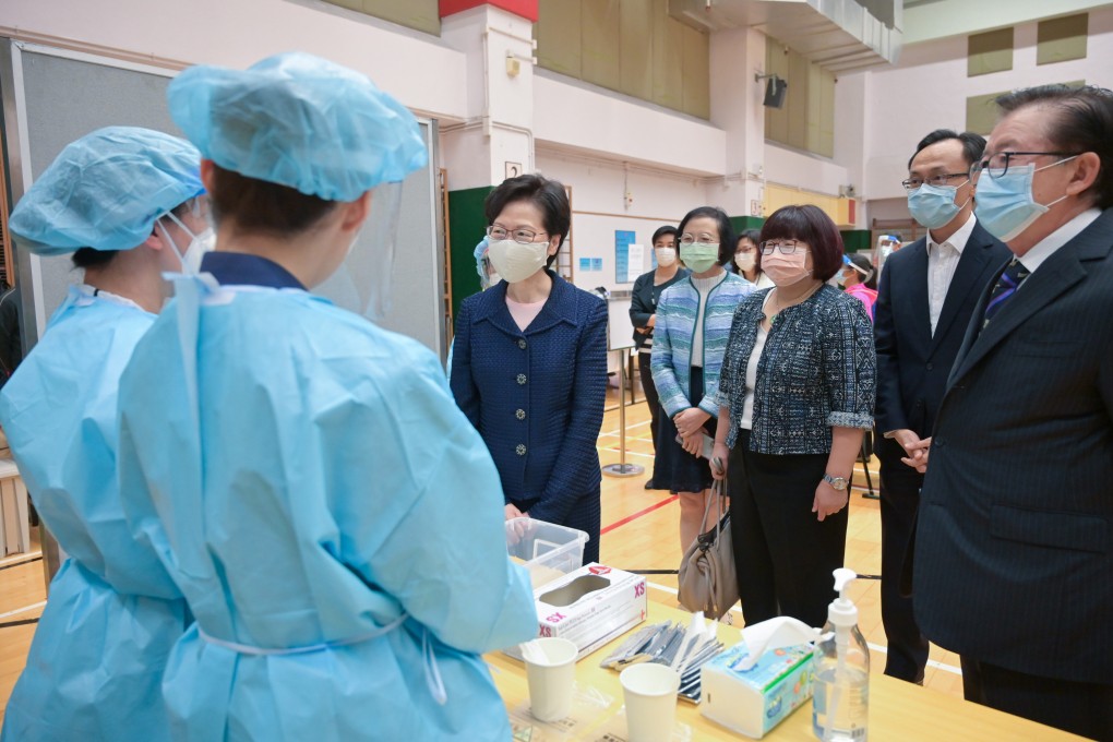 Hong Kong’s Chief Executive Carrie Lam inspects a Covid testing centre. Photo: Xinhua