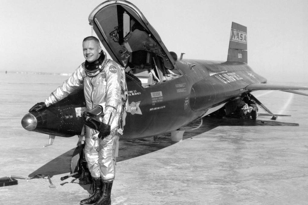 Neil Armstrong, who would become the first astronaut to set foot on the Moon, poses with an X-15 aircraft at the Dryden Flight Research Centre in California, in an undated photo. The X-15 planes used skid landing gears. Photo: Reuters/Nasa