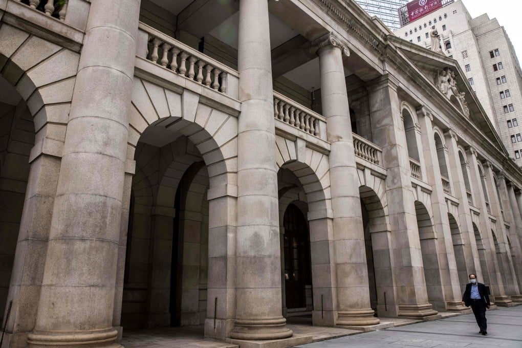 A man walks past the Court of Final Appeal in Hong Kong on March 31. Photo: AFP