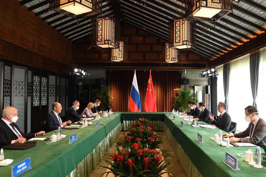Chinese Foreign Minister Wang Yi (second right) talks to Russian Foreign Minister Sergey Lavrov in Tunxi, Anhui province, on March 30. Photo: Xinhua