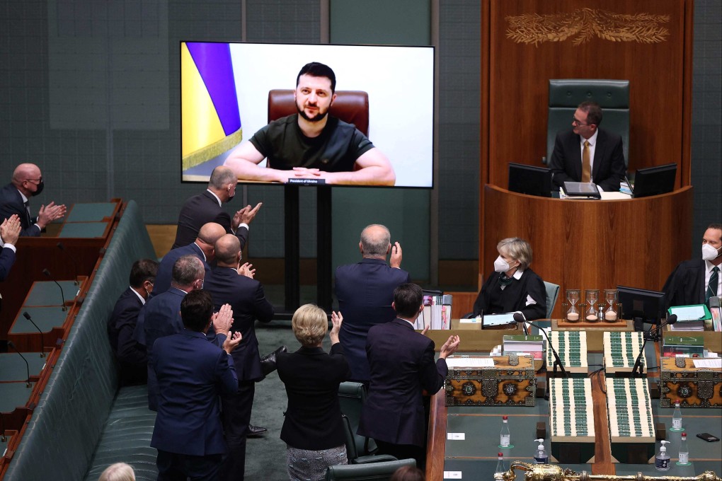 Ukrainian President Volodymyr Zelensky gets a standing ovation from the Australian Parliament on March 31. Photo: AFP