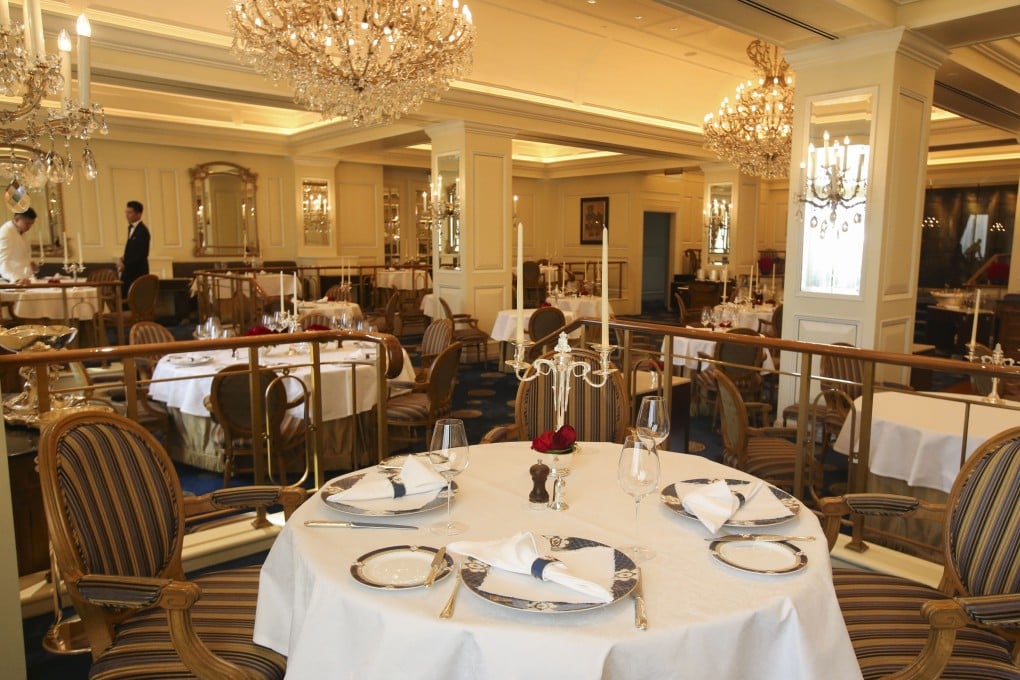 Gaddi’s, Hong Kong’s first ever fine dining restaurant, is an iconic spot where the private lift, blue and gold carpeting, chandeliers and live band are all part of the old school charm. Photo: SCMP