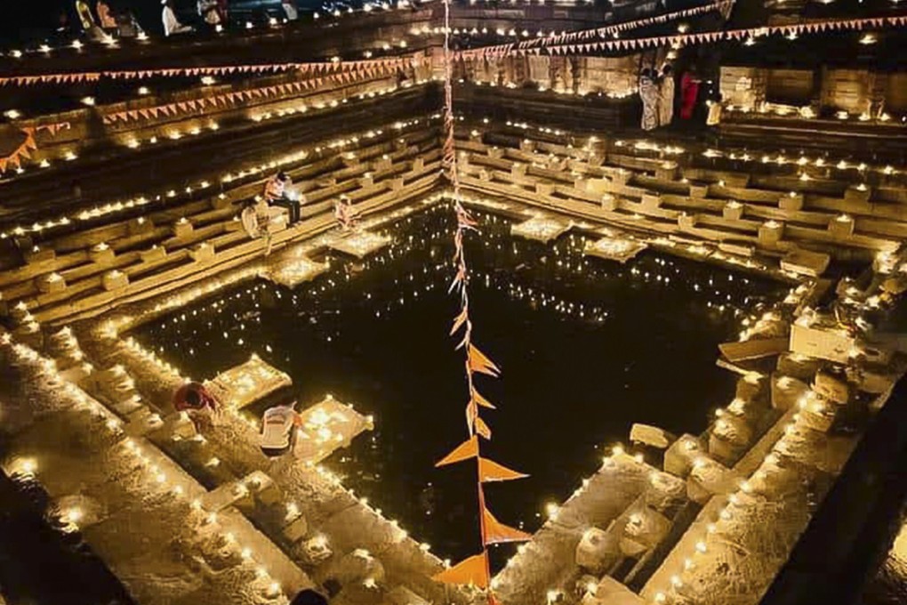 A stepwell in Deulgaon Village, in Ahmednagar District, in India’s  Maharashtra state, lit with diyas, or small earthen lamps, on the annual Hindu festival of Maha Shivaratri.