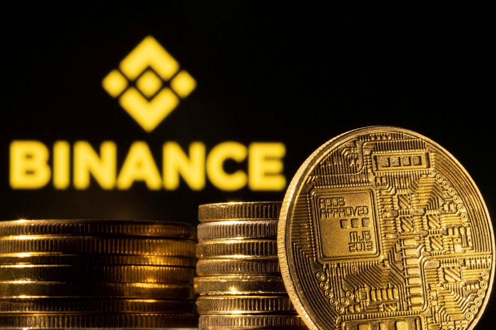 A representation of a cryptocurrency seen in front of Binance logo in this illustration taken on March 4, 2022. Photo: Reuters