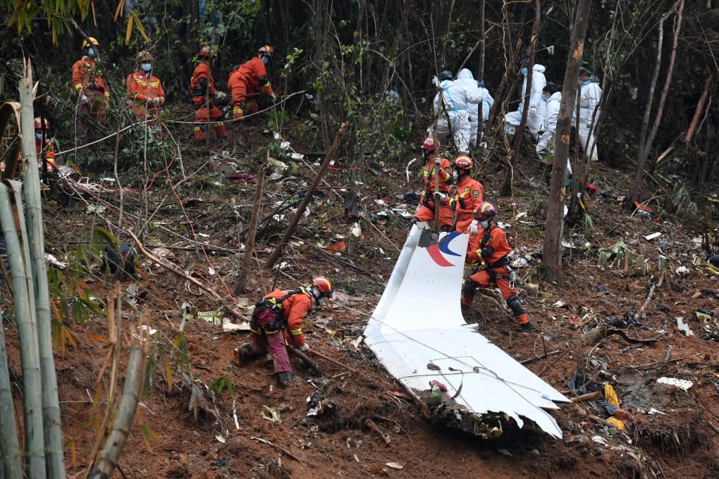 Rescuers at the site where a China Eastern plane crashed on March 21 in the Guangxi Zhuang region. Photo: Xinhua