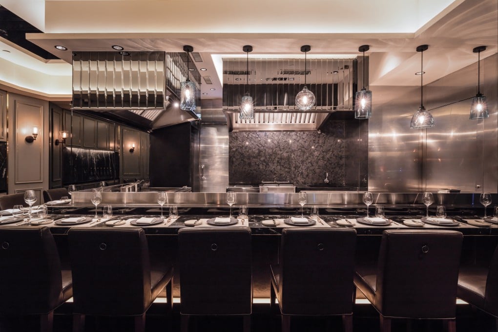 The open kitchen at Takumi puts chef Daisuke Mori’s skills in the spotlight as he prepares a seasonal nine-course menu of Japanese ingredients executed in French style. Photo: Handout