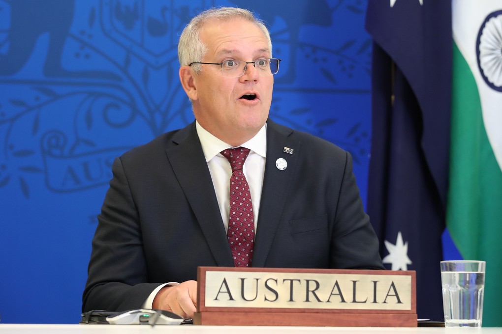 Australian Prime Minister Scott Morrison reacts during a virtual leaders summit with Indian Prime Minister Narendra Modi. Photo: EPA-EFE