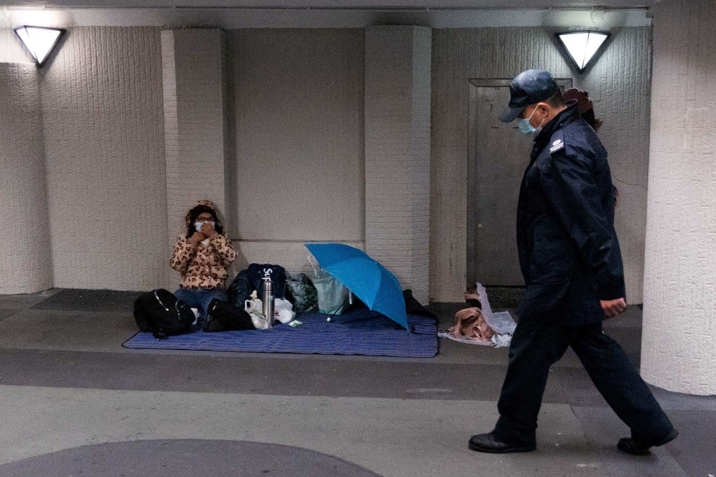 A foreign domestic worker in Hong Kong in February, amid the coronavirus outbreak. Few have suffered more during the city’s pandemic restrictions than the hundreds of thousands of women, mainly from the Philippines and Indonesia, who work as domestic helpers. Photo: AFP