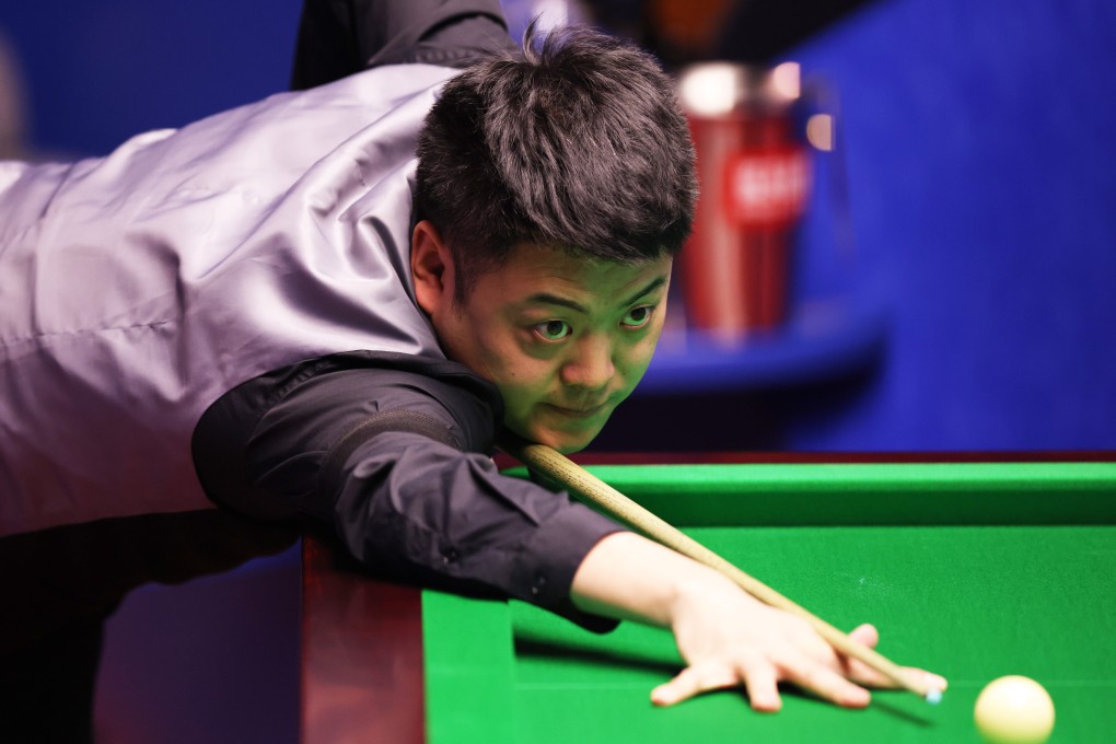 Liang Wenbo of China in a game at the World Snooker Championships event round one against Neil Robertson at the Crucible Theatre in Sheffield in England in 2021. Photo: Getty Images