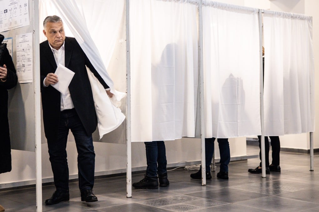 Hungarian PM Viktor Orban leaves a booth after marking his ballot at a polling station in Budapest. Photo: Bloomberg