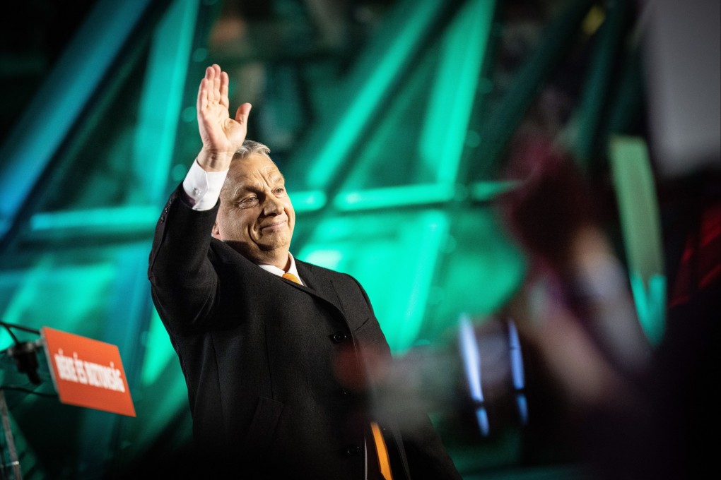 Hungarian Prime Minister Viktor Orban waves to his supporters in Budapest on Sunday. Photo: EPA-EFE