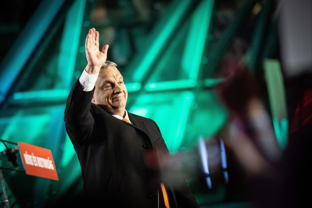 Hungarian Prime Minister Viktor Orban waves to his supporters in Budapest on Sunday. Photo: EPA-EFE