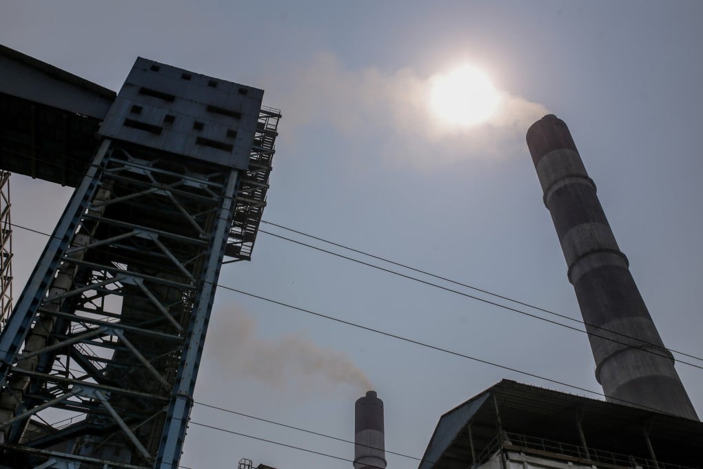 Chimneys at a coal-fired power plant in Andhra Pradesh, India. Photo: Bloomberg