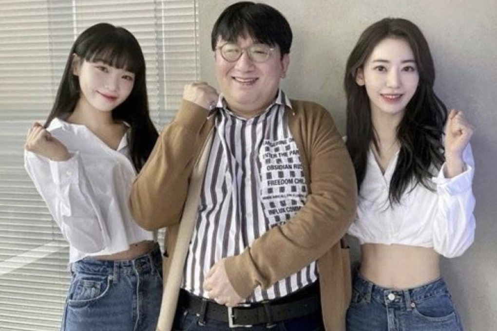 Hybe chairman Bang Si-hyuk, centre, with Kim Chae-won, left, and Sakura, two of the members of soon-to-launch girl group Lesserafim. Photo: Instagram