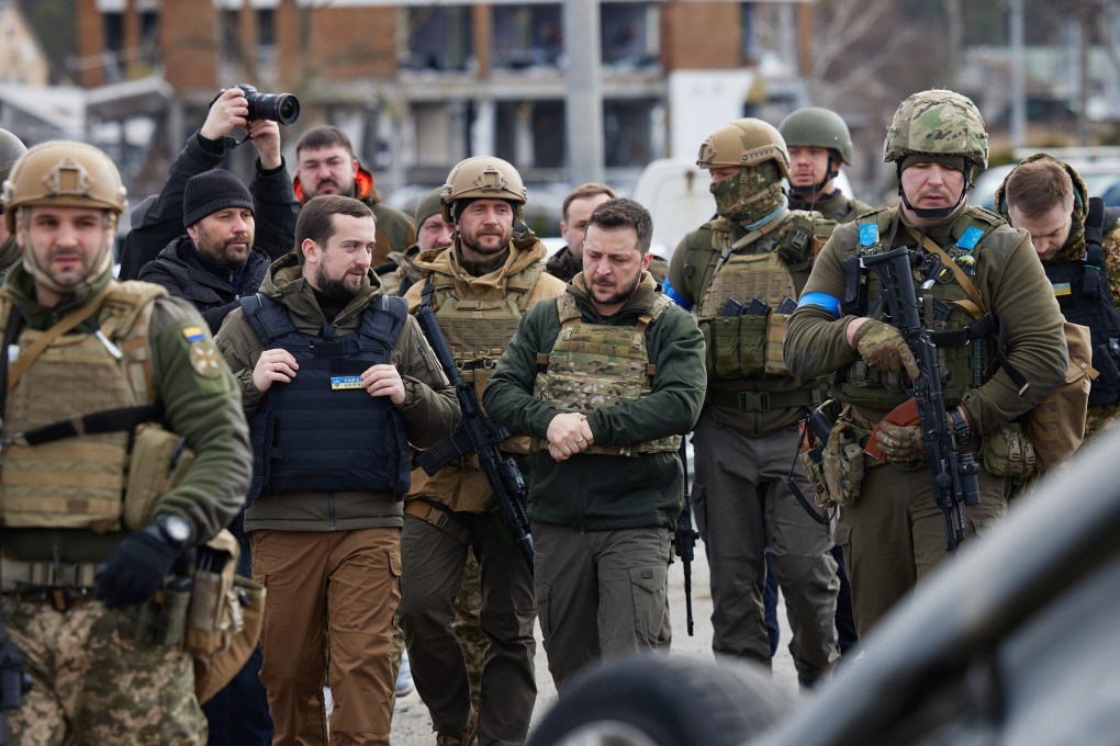 Ukrainian President Volodymyr Zelensky (centre) visiting Bucha on Monday, where mass killings of civilians occurred during the occupation by Russian troops. Photo: President Of Ukraine/ZUMA Press Wire Service/dpa