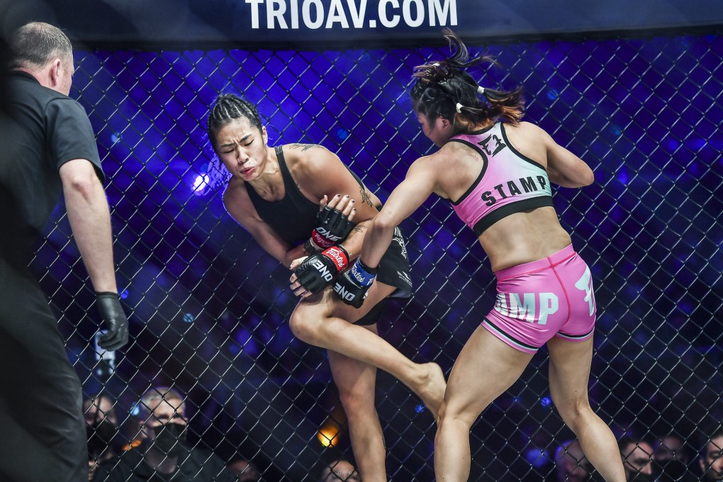 Stamp Fairtex (right) hurts Angela Lee with a body shot at ONE X. Photos: ONE Championship.