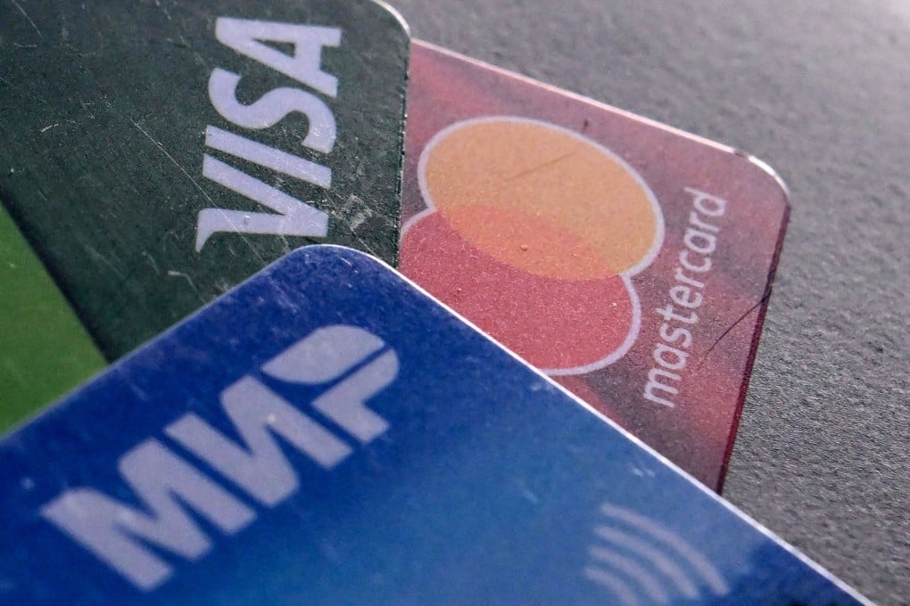Visa and MasterCard have stopped servicing Russian accounts abroad. Russian banks are seeing an increased demand for cards linked to the Mir domestic payment system. Photo: AFP