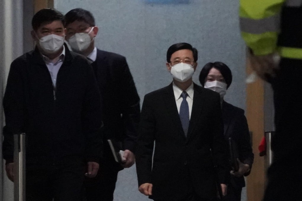 John Lee prepares to meet the press over his resignation and bid for chief executive. Photo: Felix Wong