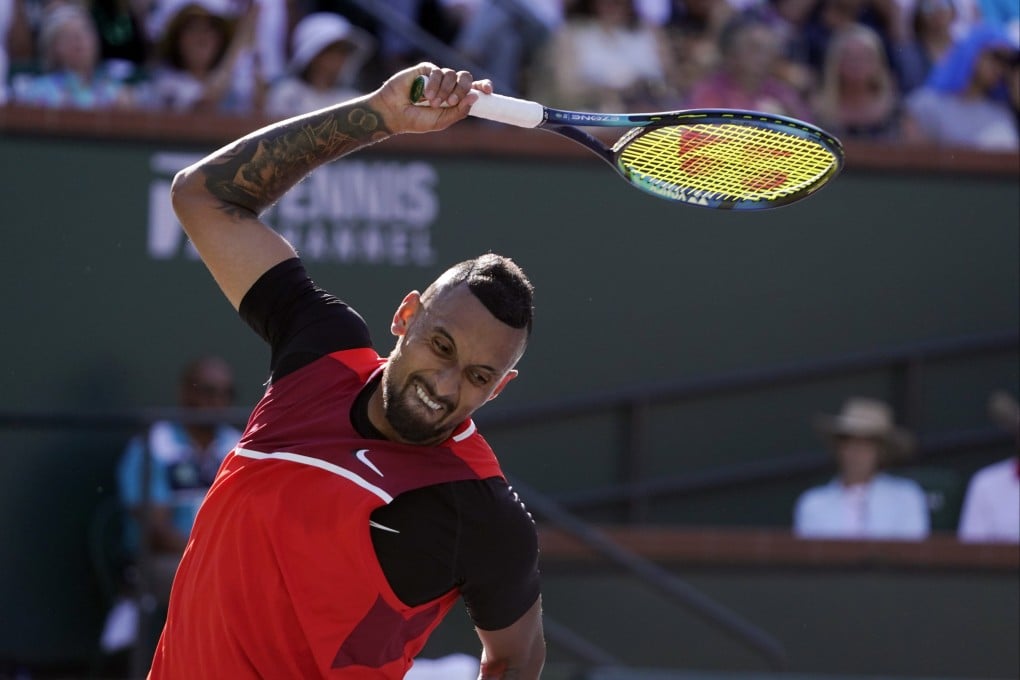 Nick Kyrgios tosses his racket after losing a point to Rafael Nadal during the BNP Paribas Open tennis tournament. Photo: AP