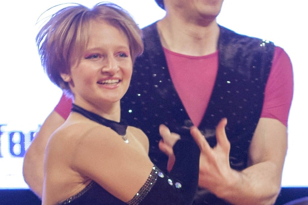 Katerina Tikhonova, daughter of Russian President Vladimir Putin, dances with Ivan Klimov during a competition in Krakow, Poland, in April 2014. Photo: Reuters